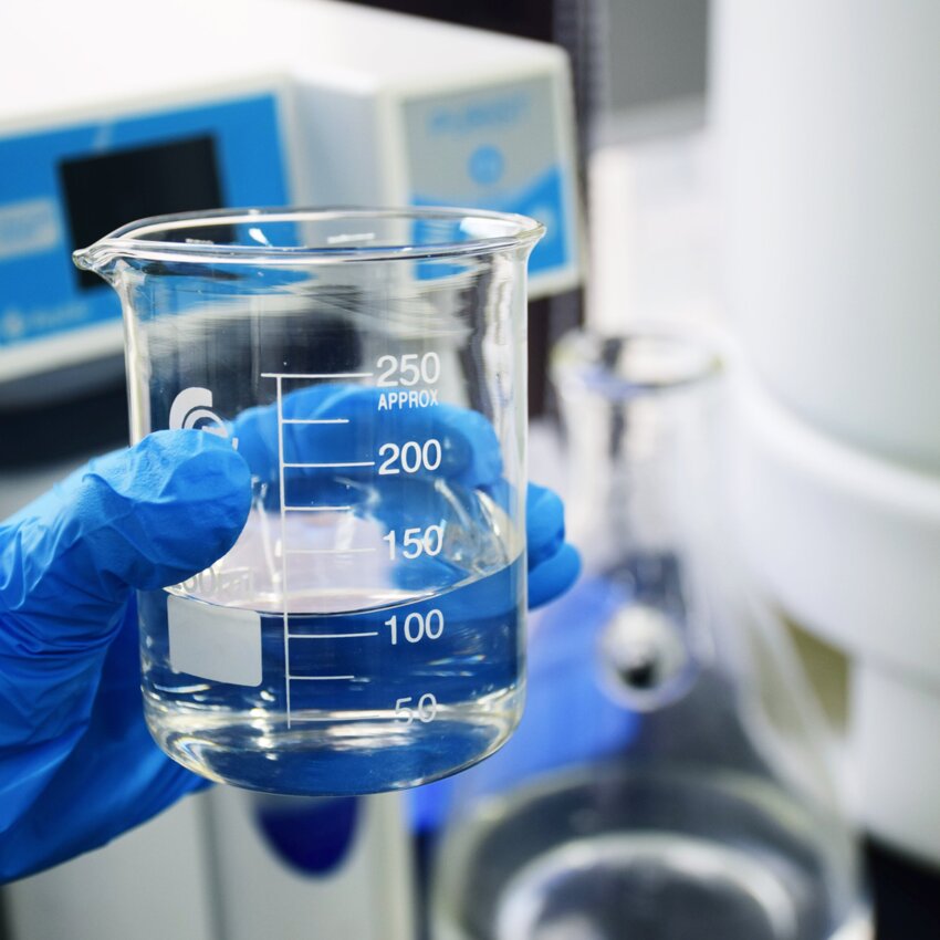 Using a filled beaker in the laboratory